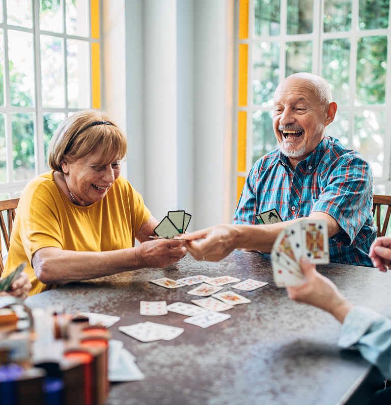 Seniors-playing-card-games-at-a-board-and-care-facility